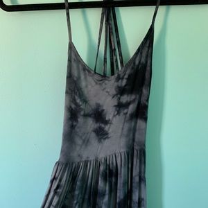 a very flowy dress, has many straps and is comfy